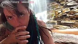 We caught this german brunette riding a muscular guy in a waterfall.