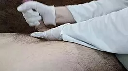 Hungarian Nurse in Gloves Aids Sperm Donation