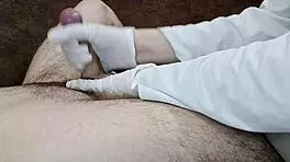 Hungarian Nurse in Gloves Aids Sperm Donation