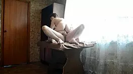 beautiful young girl fucking on a table with her feet bare and tits out 😍