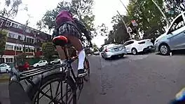 showing off miniskirt upskirt while strolling through the city