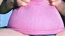 Indian housewife with natural curves relaxes at home