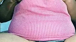 Indian housewife with natural curves relaxes at home