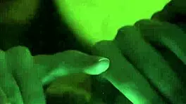 Sleepless girl rubs her trimmed clit under handheld light at night.