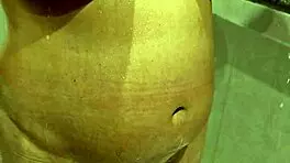 this young MILF with BIG TITS at 18-19 years old shows off her assets in a casual way