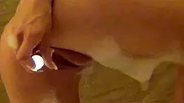 CUTE ELSA MASTURBATES NUDE IN BUBBLE BATH SHOWING SMALL TITS AND BLONDE ASS