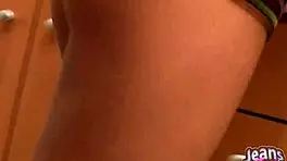 Teen babe shows off new jeans peek.