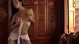 teen katie fey, busty brunette, teases topless by the door with piercing