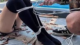 Hottie In Stockings Gets Tied And Tickled Outdoors