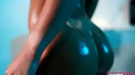 big boobs fitness model gets oiled up and covered in cum