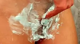 i'm spying on stepsister shaving pussy and get caught
