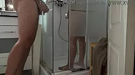 Stepson spies on stepmom’s morning shower, stroking hard.