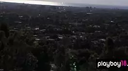 Lisa Seiffert poses naked outdoors with ripped clothes.