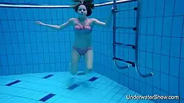 Sexy young girl reveals stunning body in underwater display