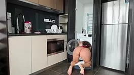 Stepsis stuck in washing machine gets a quick hard fuck with my big cock in kitchen.