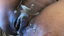 Wow, young ebony slut gets drenched in cum after homemade banging! Look at that mess!