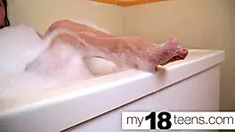 babe masturbates in bath with close-up orgasm