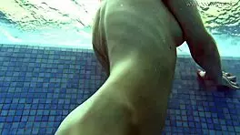 Watch Lina Mercury Tease in Red Lingerie Underwater