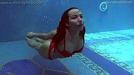 Watch Lina Mercury Tease in Red Lingerie Underwater