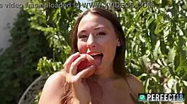 Peach Sumiko smiles while masturbating her wet pussy outdoors