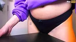 Young Russian milf teases solo on desk until she cums hard.