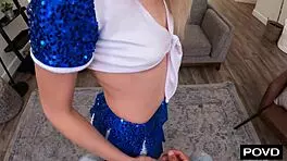 Coach Helps Cheerleader Stretch In Practice