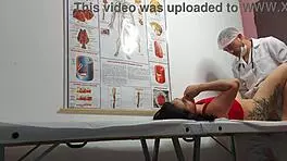 Gynecologist Examines Patient in Hospital Setting