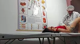 Gynecologist Examines Patient in Hospital Setting