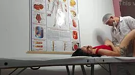 Gynecologist Examines Patient in Hospital Setting