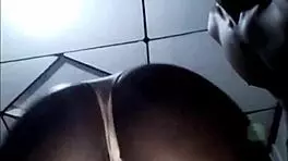 Watch this African teen slobber on my dick with her fat lips?