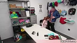 Cop questions shoplifter Aria Carson in back