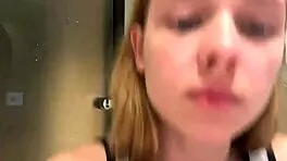 Blonde masturbates tight pussy in hotel.