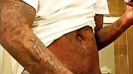 youngstarbrazy is warming up for new content, showing off her tattoo and monster cock