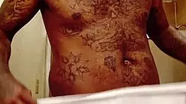 youngstarbrazy is warming up for new content, showing off her tattoo and monster cock