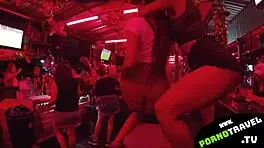 Horny petite 18+ brunette shakes ass at bar in sneakers for group swingers