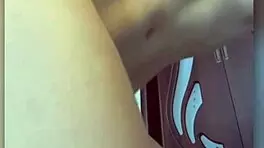 Hot striptease of long-legged beauty and passionate play with dildo