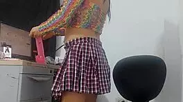 Sweet girl in miniskirt and fishnet stockings takes huge horse dildo oops