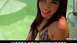 Sun Bathing Beauty Shifts Bikini for Outdoor View