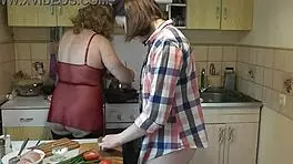 Two sexy lesbians, a blonde milf and a cute girl, tease in the kitchen with lingerie and perfect asses