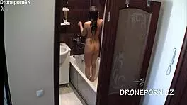 Cute teen aurora spied on in the shower, her small tits exposed as she bathes secretly.