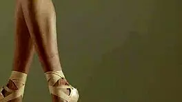 Blonde gymnast just casually showing off moves in a naked workout.