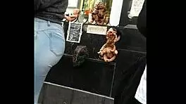 teen latina with tight jeans showing off her curves in a voyeur scene