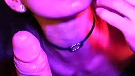 babe gives deepthroat blowjob in neon lights, swallows it all