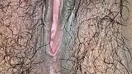 Desi housewife moans loud during close-up hairy pussy worship. Tight Asian solo action!