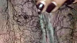 Desi housewife moans loud during close-up hairy pussy worship. Tight Asian solo action!