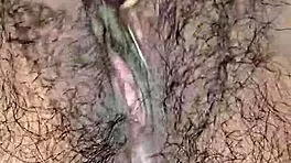 Desi housewife moans loud during close-up hairy pussy worship. Tight Asian solo action!