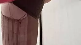 Watch Mistress Elza Kom dominate with ponytail and ripped clothes! Feel the BDSM heat as she sniffs panties!