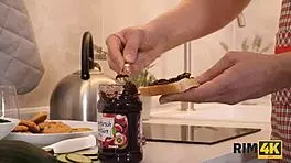 Sexy redhead girlfriend kicks off the morning with rimming and blowjob in the kitchen. Her shaved pussy adds extra spice