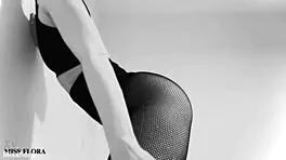 Fishnet-clad ass teases feet in black and white!