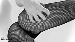 Fishnet-clad ass teases feet in black and white!